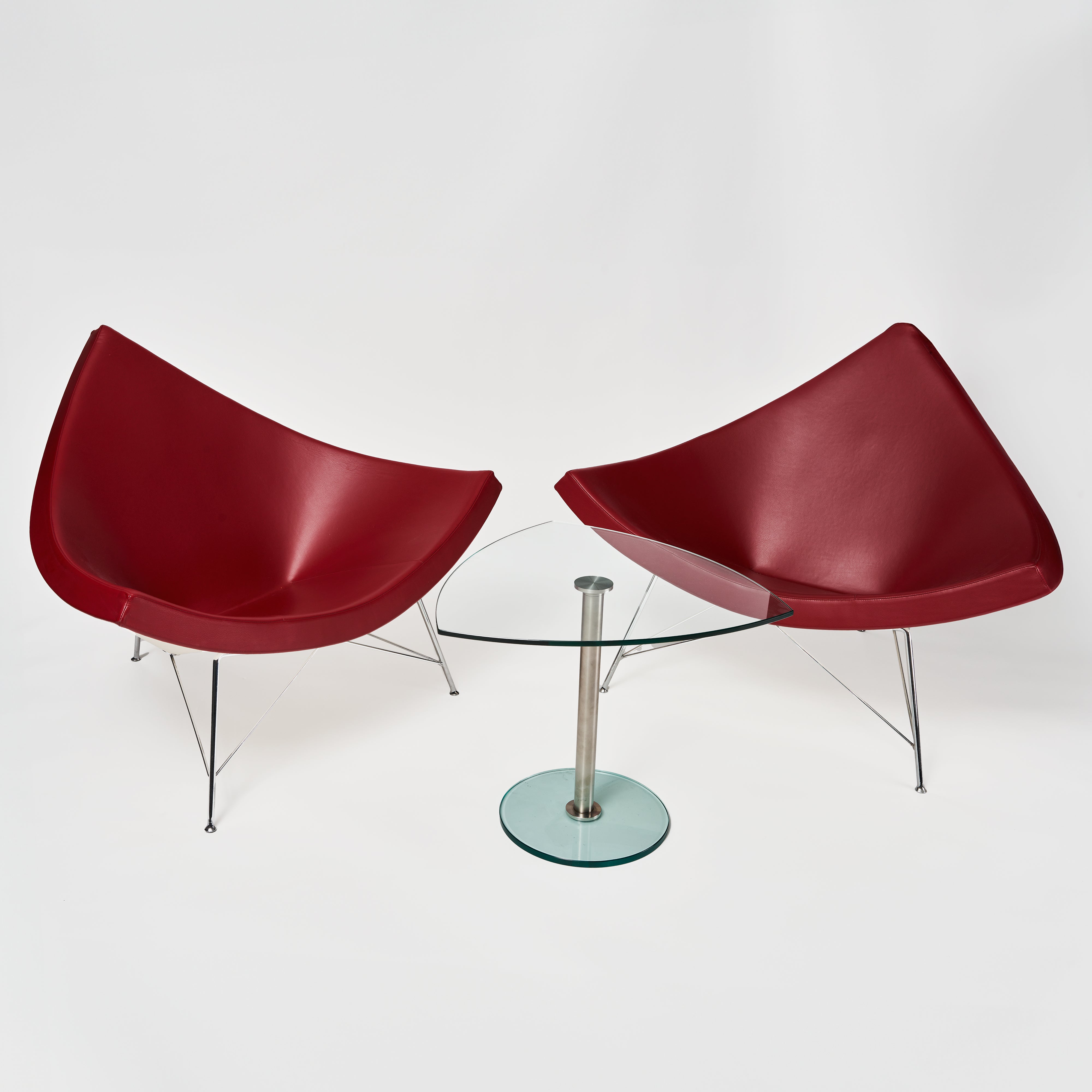 Paar Designersessel Vitra Coconut in Rot